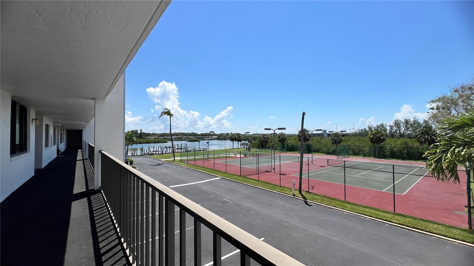 Front door overlooks the tennis/pickleball courts