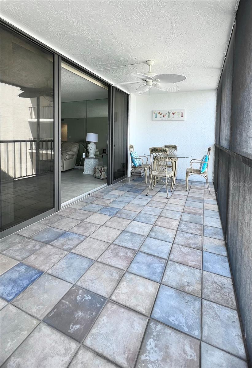 Screen balcony across the entire condo