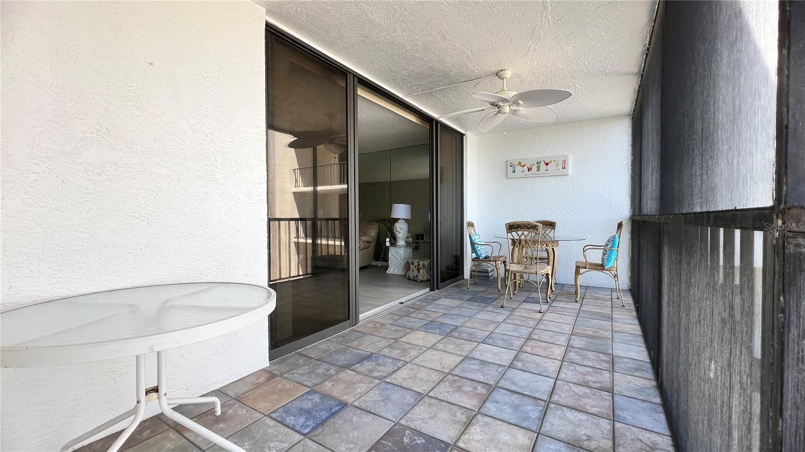 Screen balcony across the entire condo