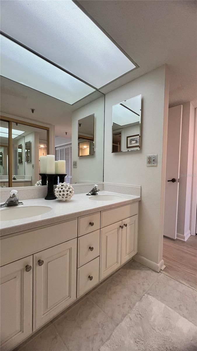 Primary bathroom with double vanity sinks