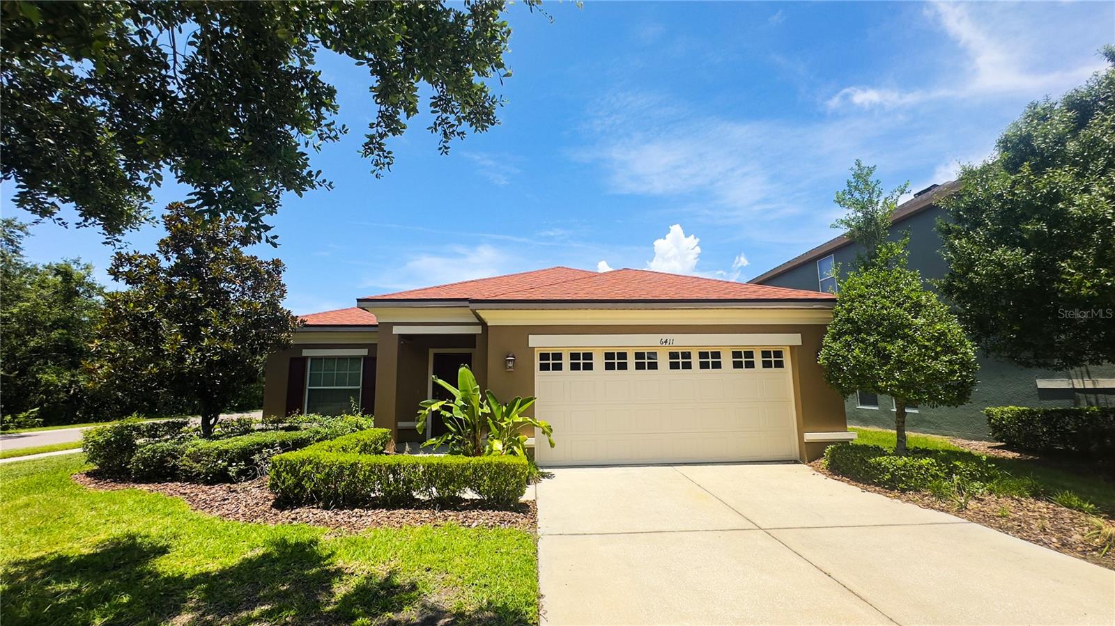 Mature landscaping and beautiful nature surround your home