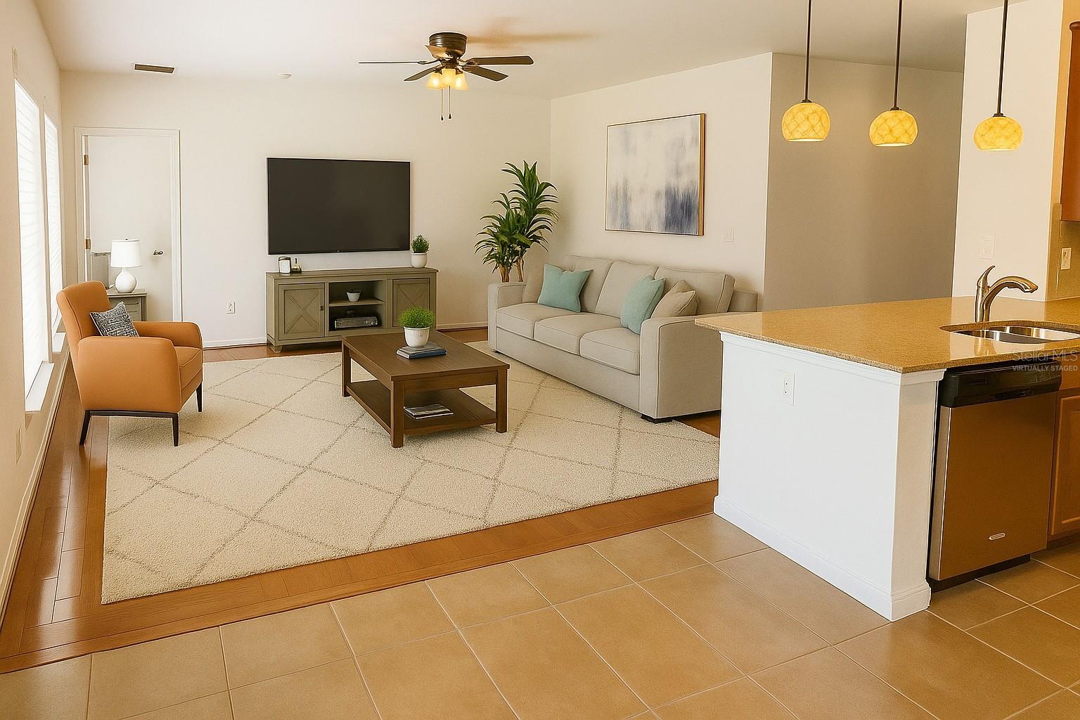 VIRTUALLY STAGED LIVING ROOM from kitchen view