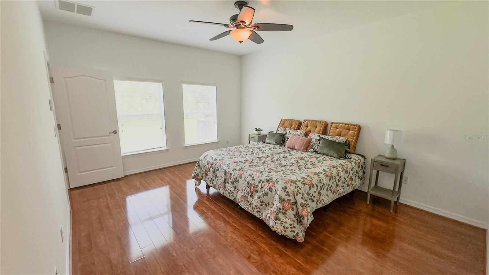Let nature and alot of natural light wake you up every morning with large windows that overlook the back yard and wooded area.