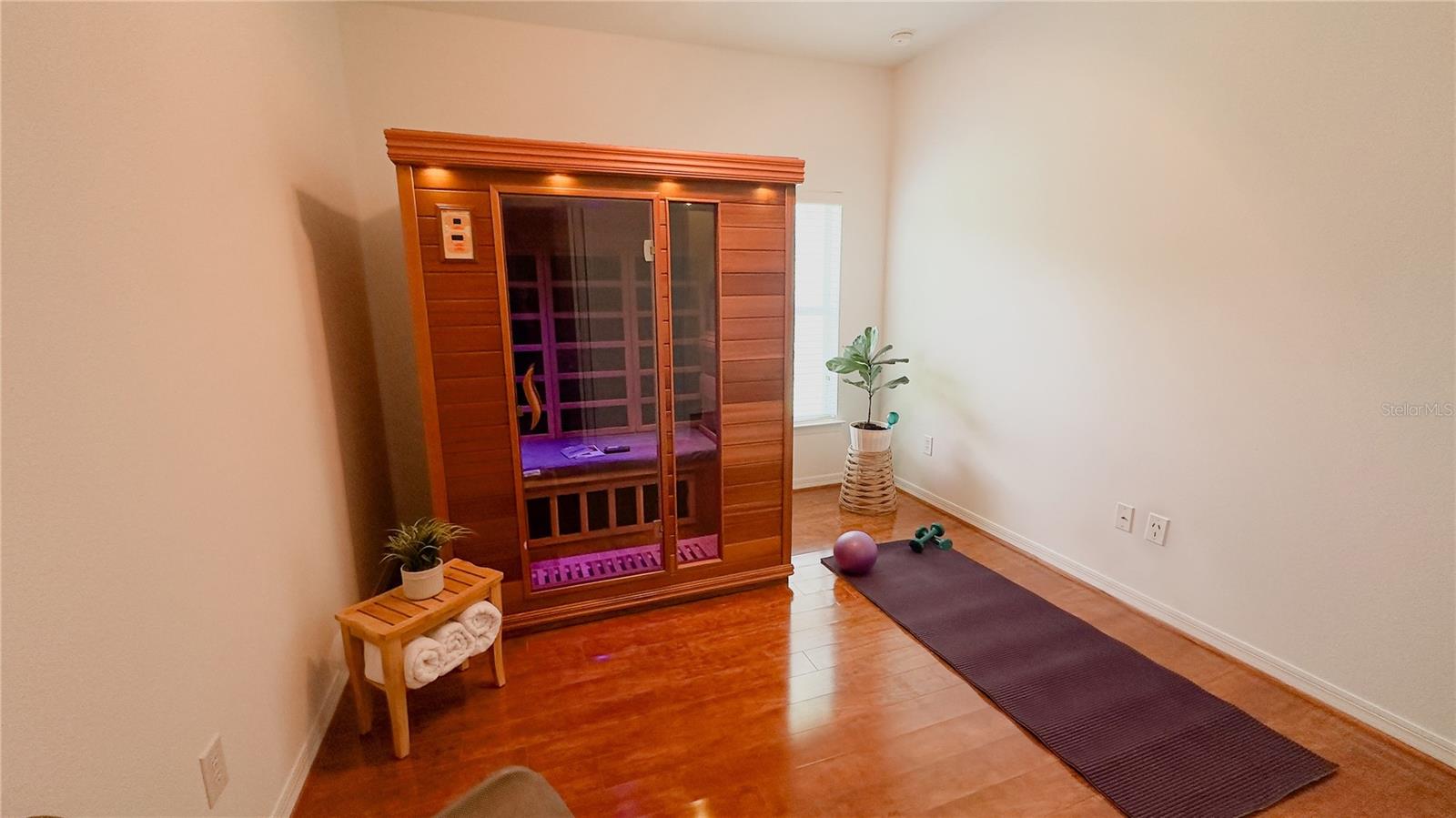 Bedroom 3 used as a sauna and workout room. Why pay for a gym membership when you have this at home?