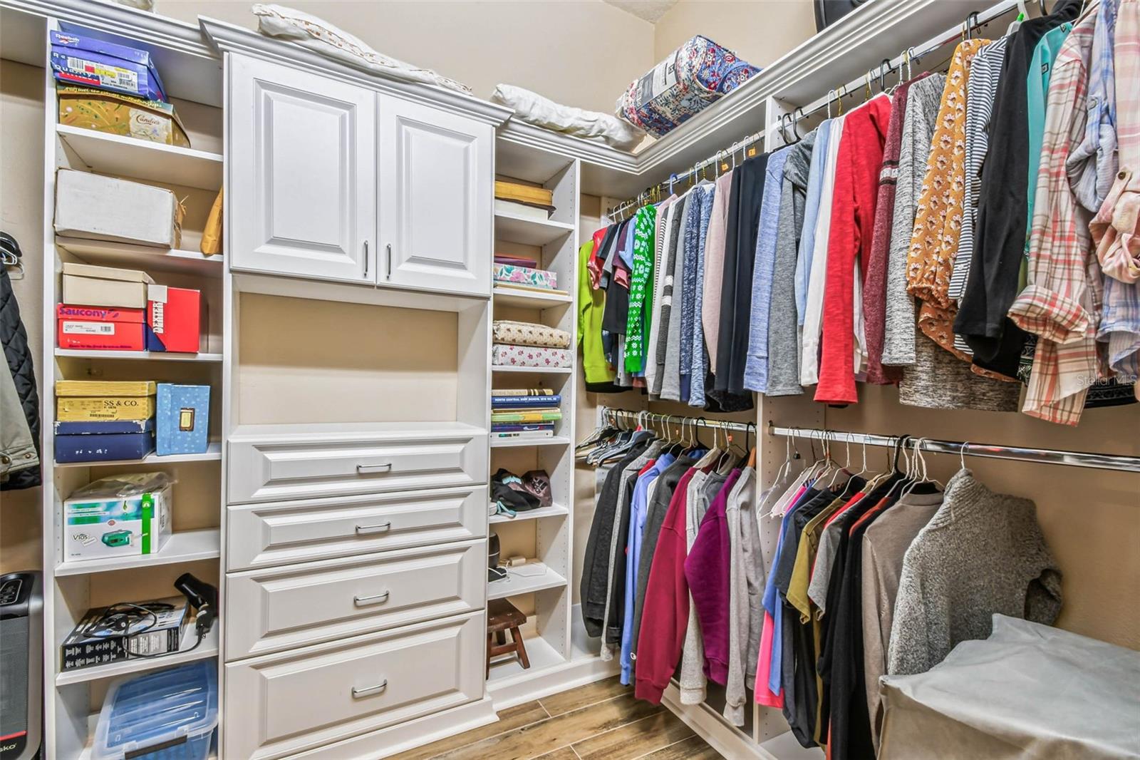 Custom built ins in both primary closets