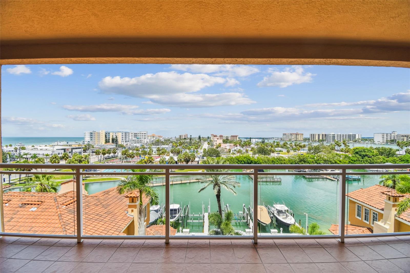 Walk into this Condo home with marvelous views of the Gulf, Intracoastal and Mandalay Channel