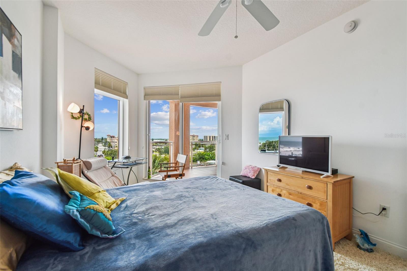 Guest Bedroom opens to breathtaking views of Mandalay Channel