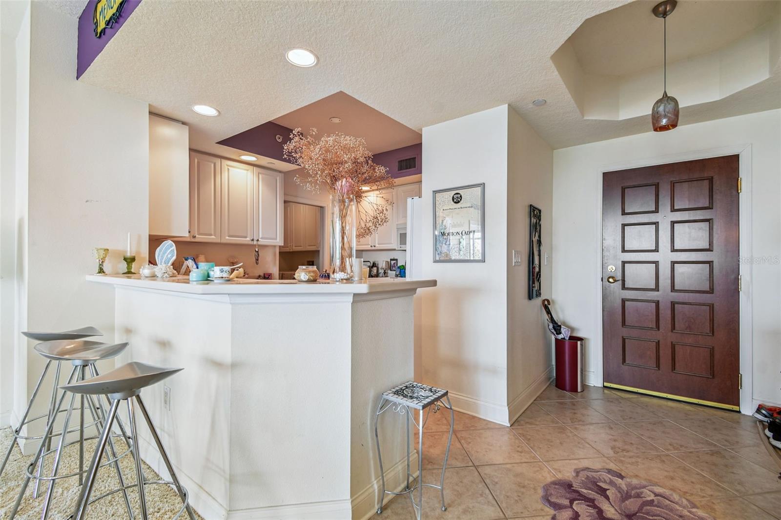 The Kitchen with a counter for a quick snack