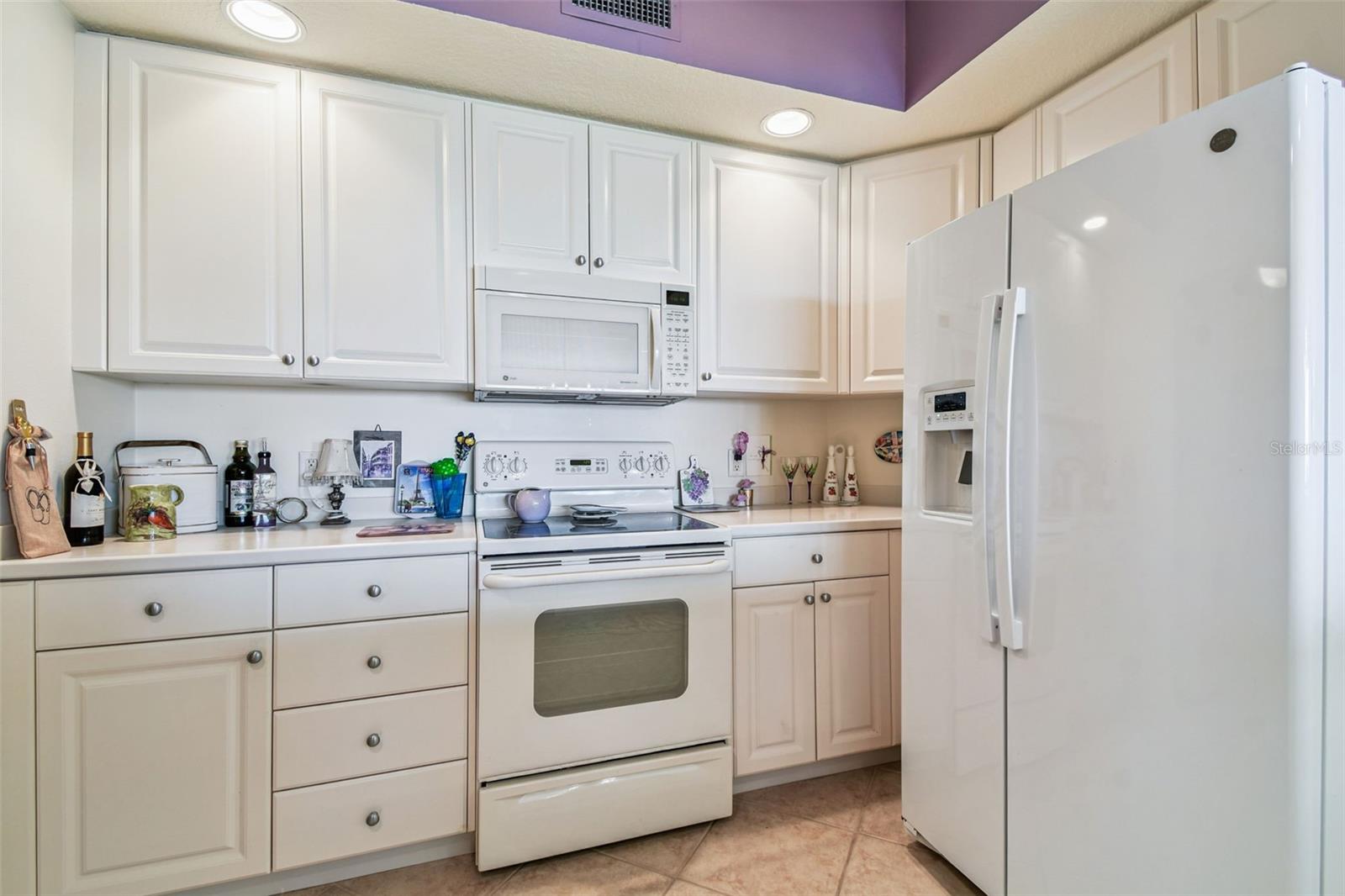The Kitchen, light and bright, with shaker style white cabinets