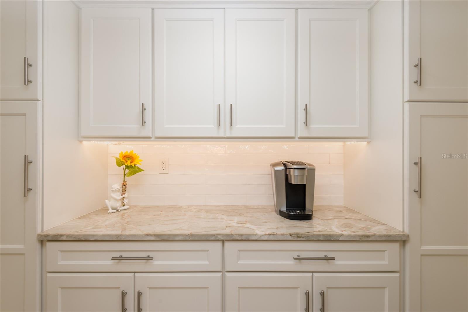 Walk in pantry/open storage area to kitchen