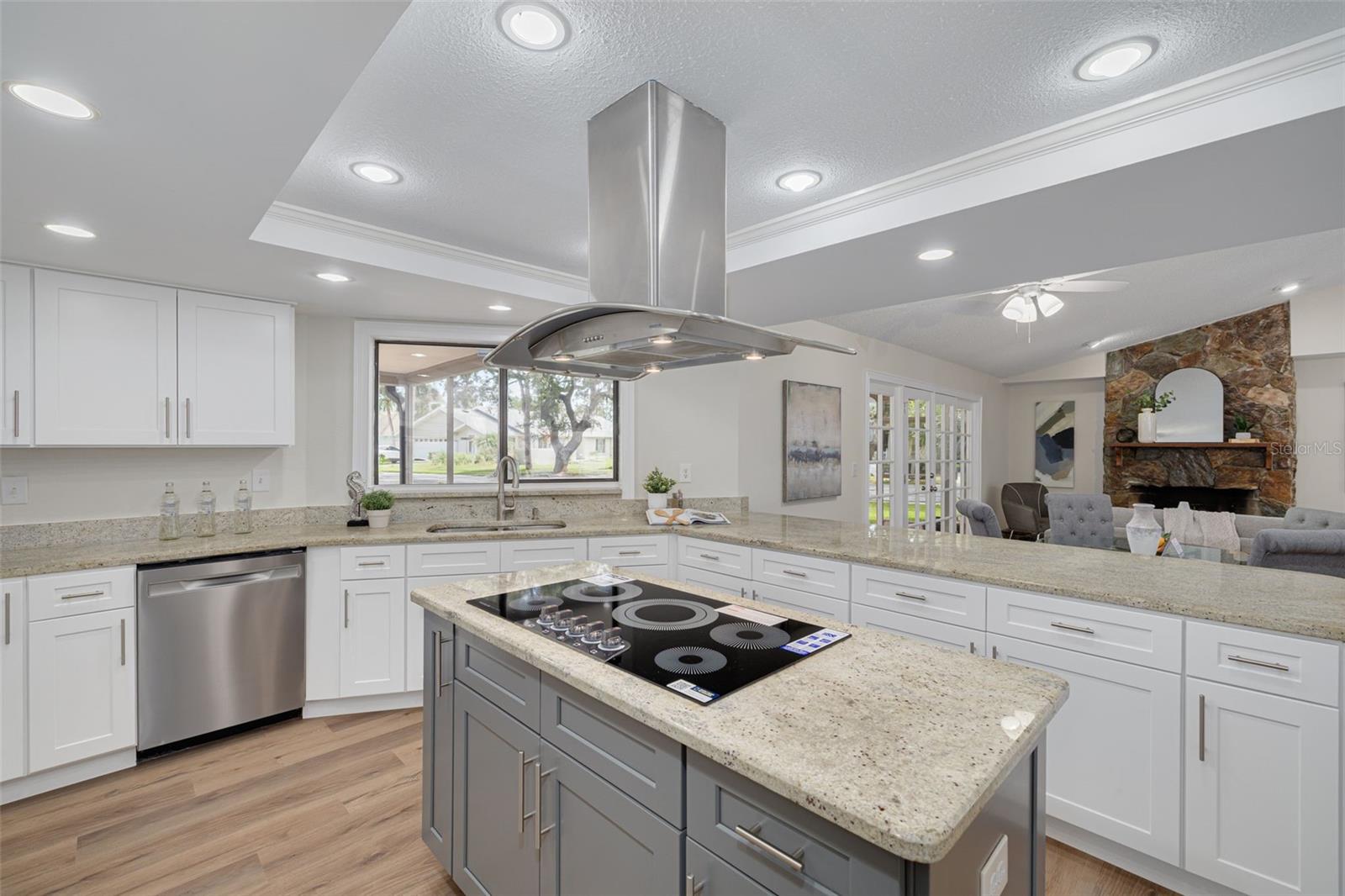 Center island with Frigidaire Gallery glass cooktop and plenty of storage!