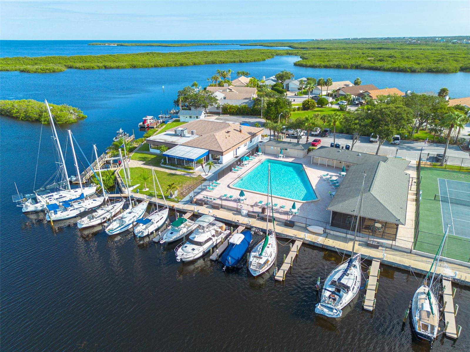 Easy access to the Gulf from the boat slips at the residents-only yacht club (membership required). Gulf Harbors Woodlands residents have access to the pool and tennis courts!