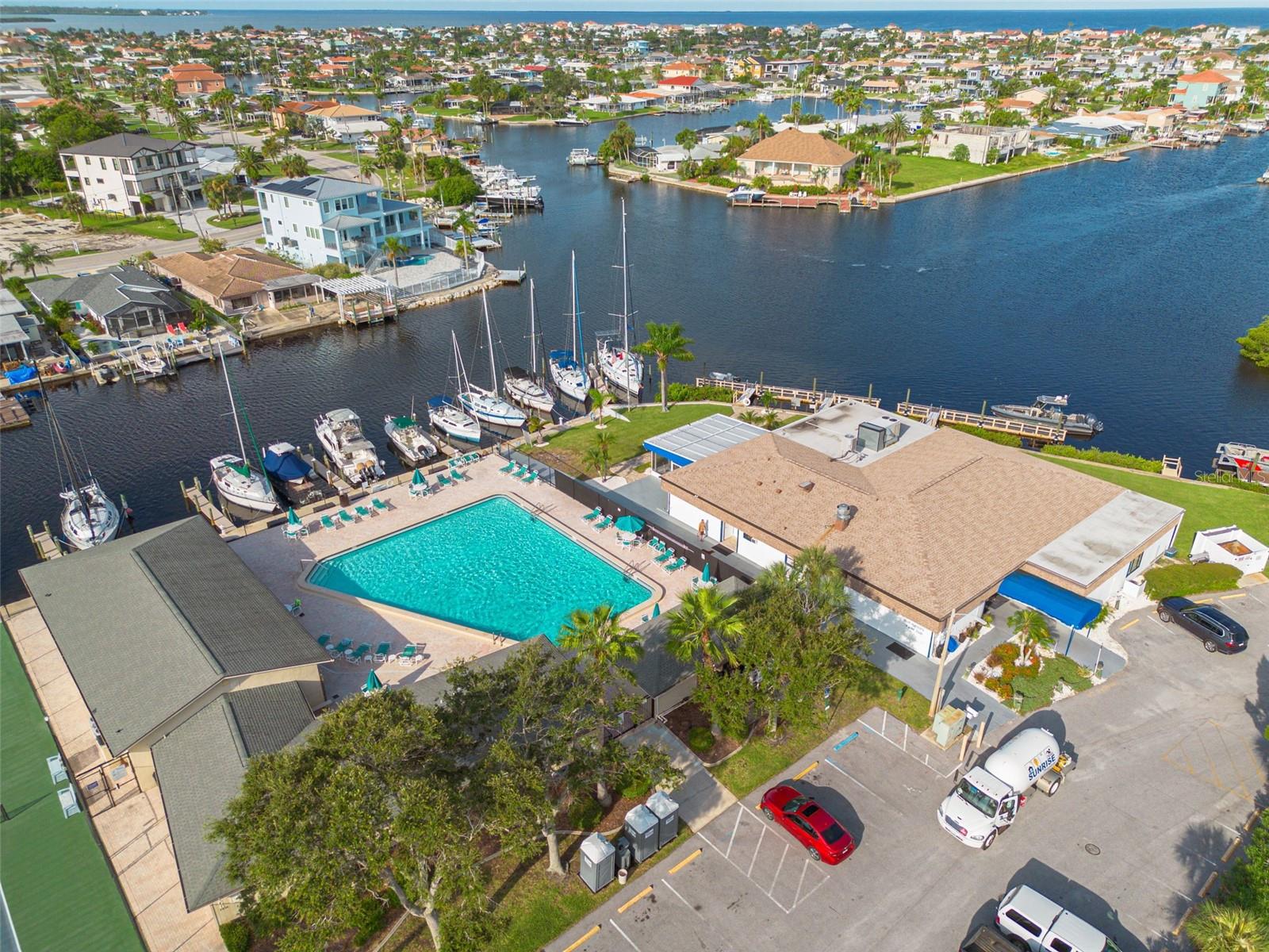 Gulf Harbors Woodlands Association tennis courts and pool, plus a Yacht Club and boat slips (membership/fee)