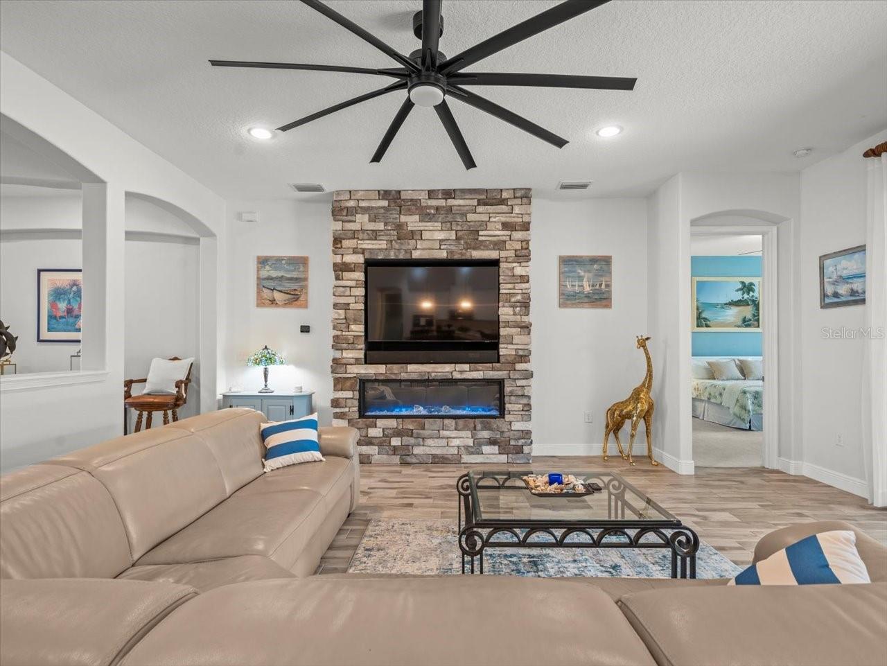 Family Room with built-in Electric fireplace and upgraded stone accents