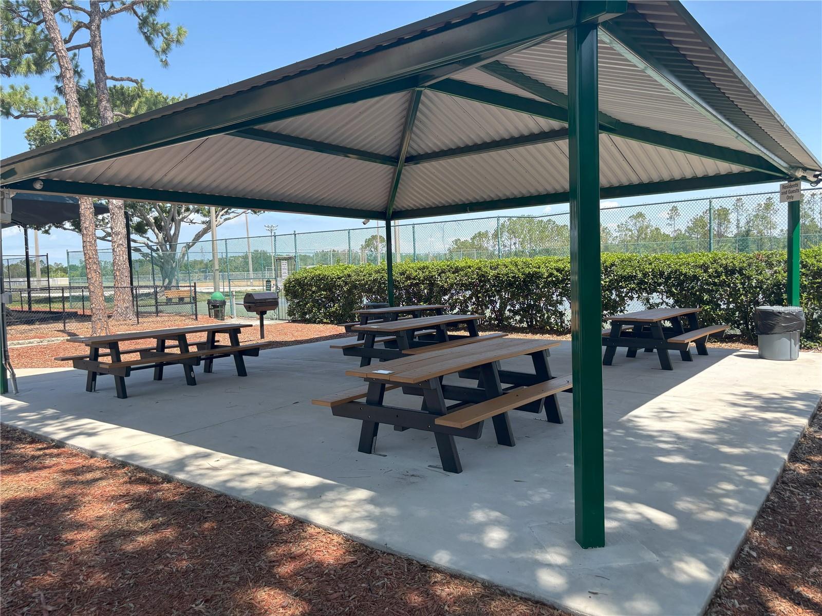 Outdoor seating near tennis courts