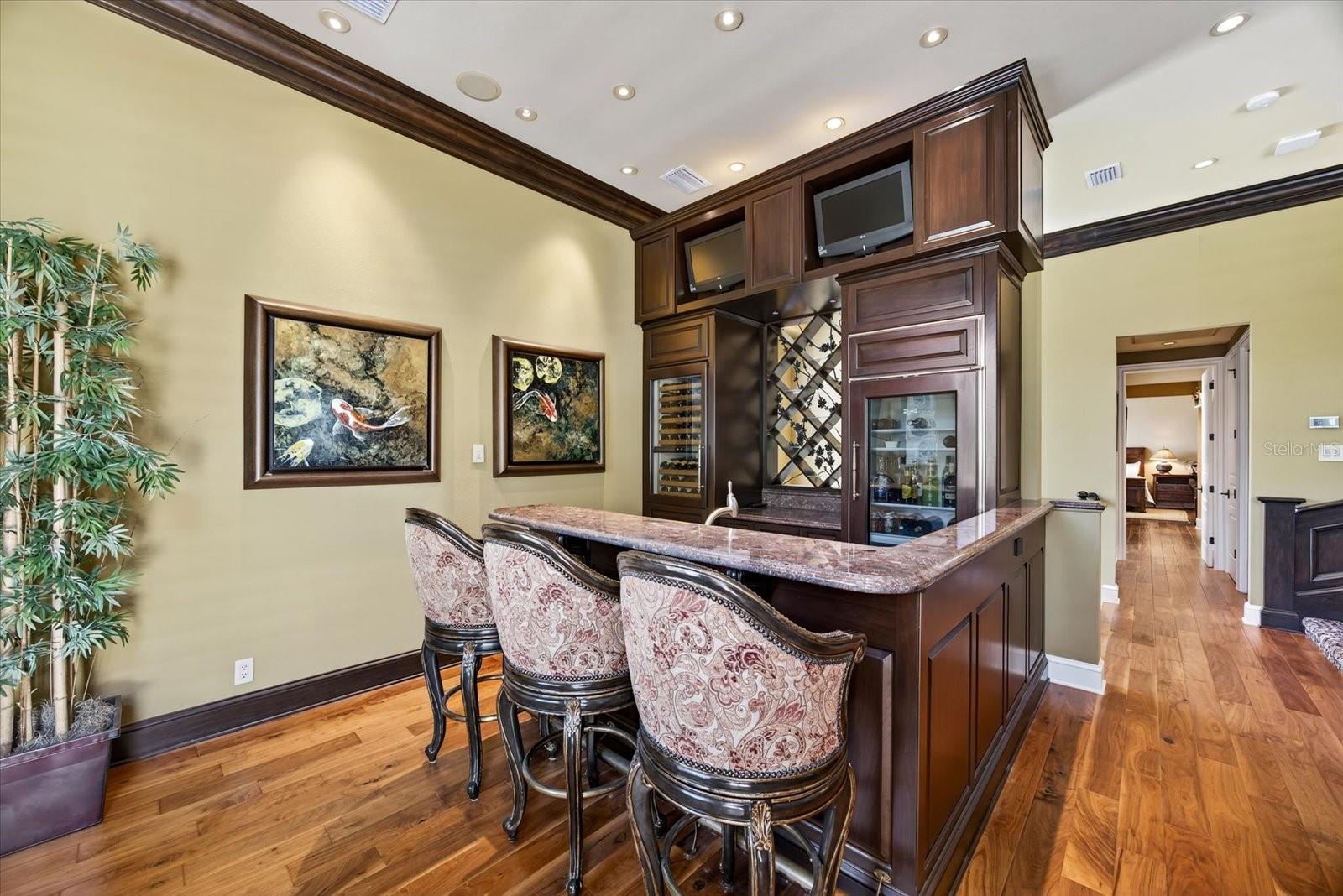 Upstairs Bar equipped with Wine and Beverage Refrigerators and Dishwasher