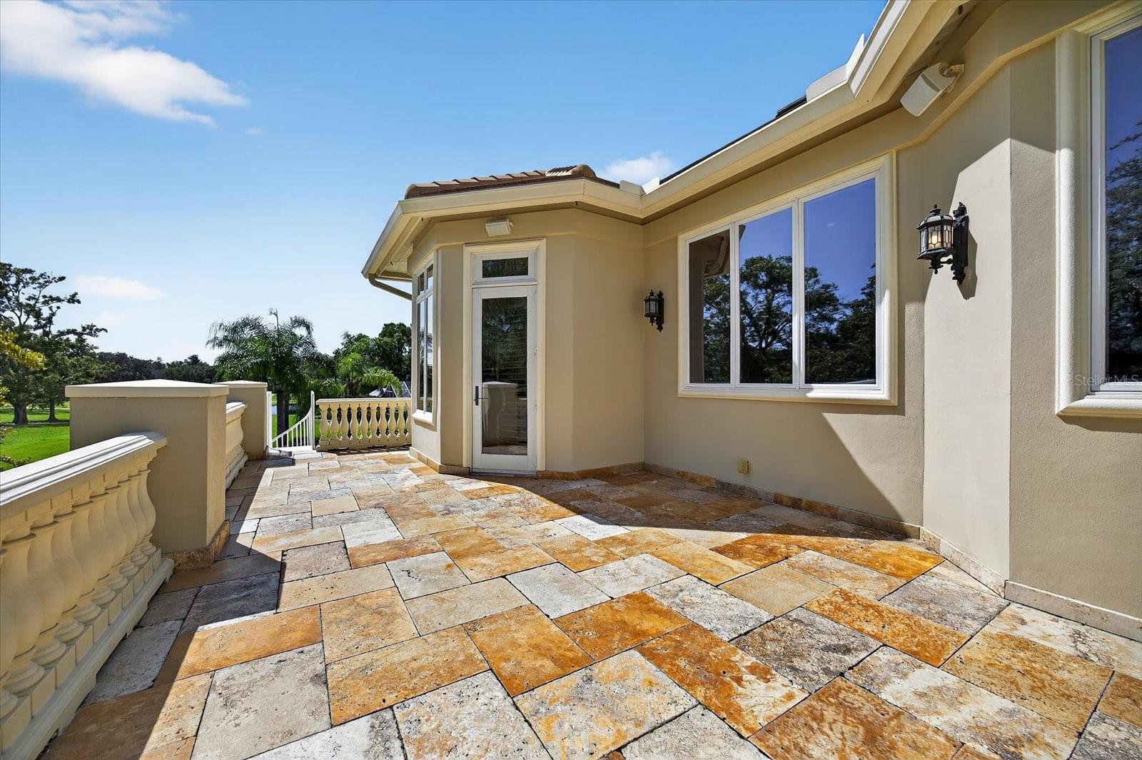 Travertine Balcony off of the Game Room