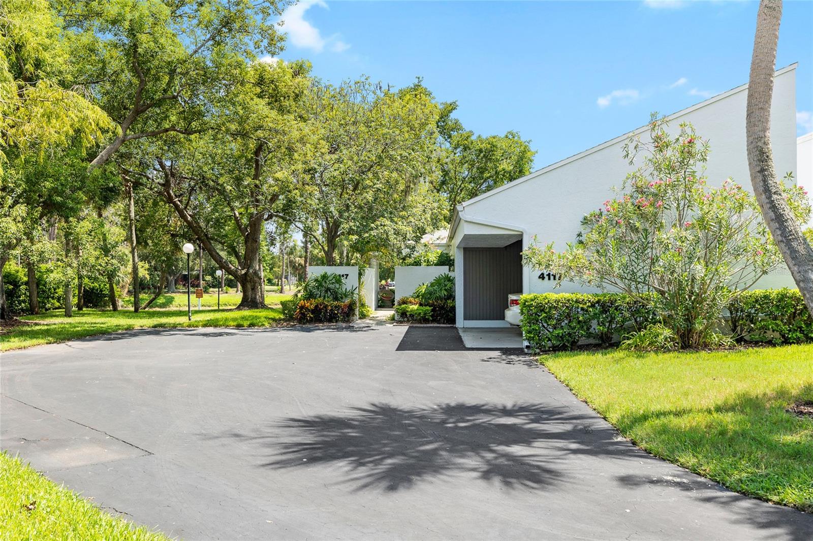 end unit with huge driveway