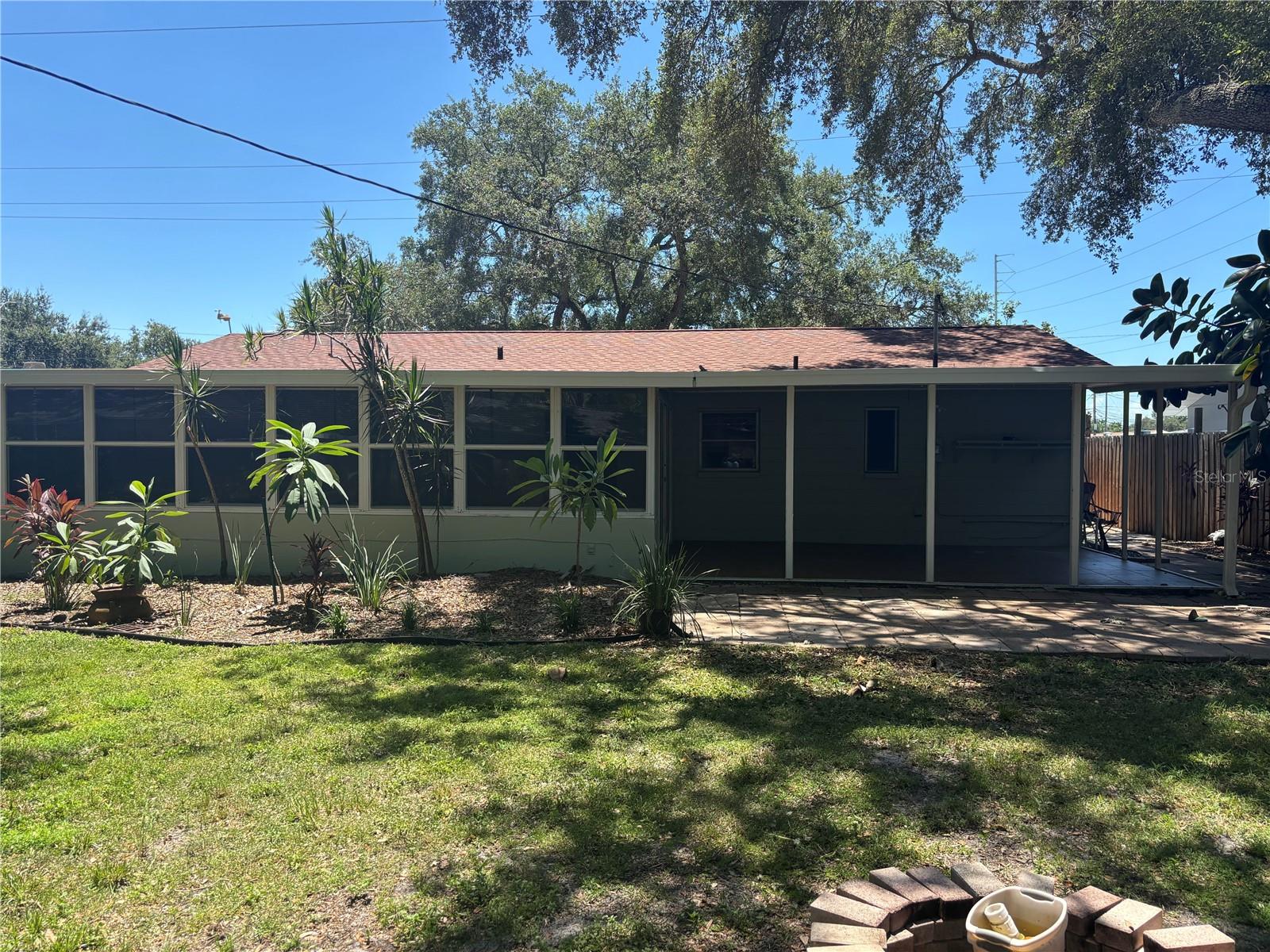 Huge back yard with large 438 sq ft Enclosed Finished porch and additional covered patio/back porch