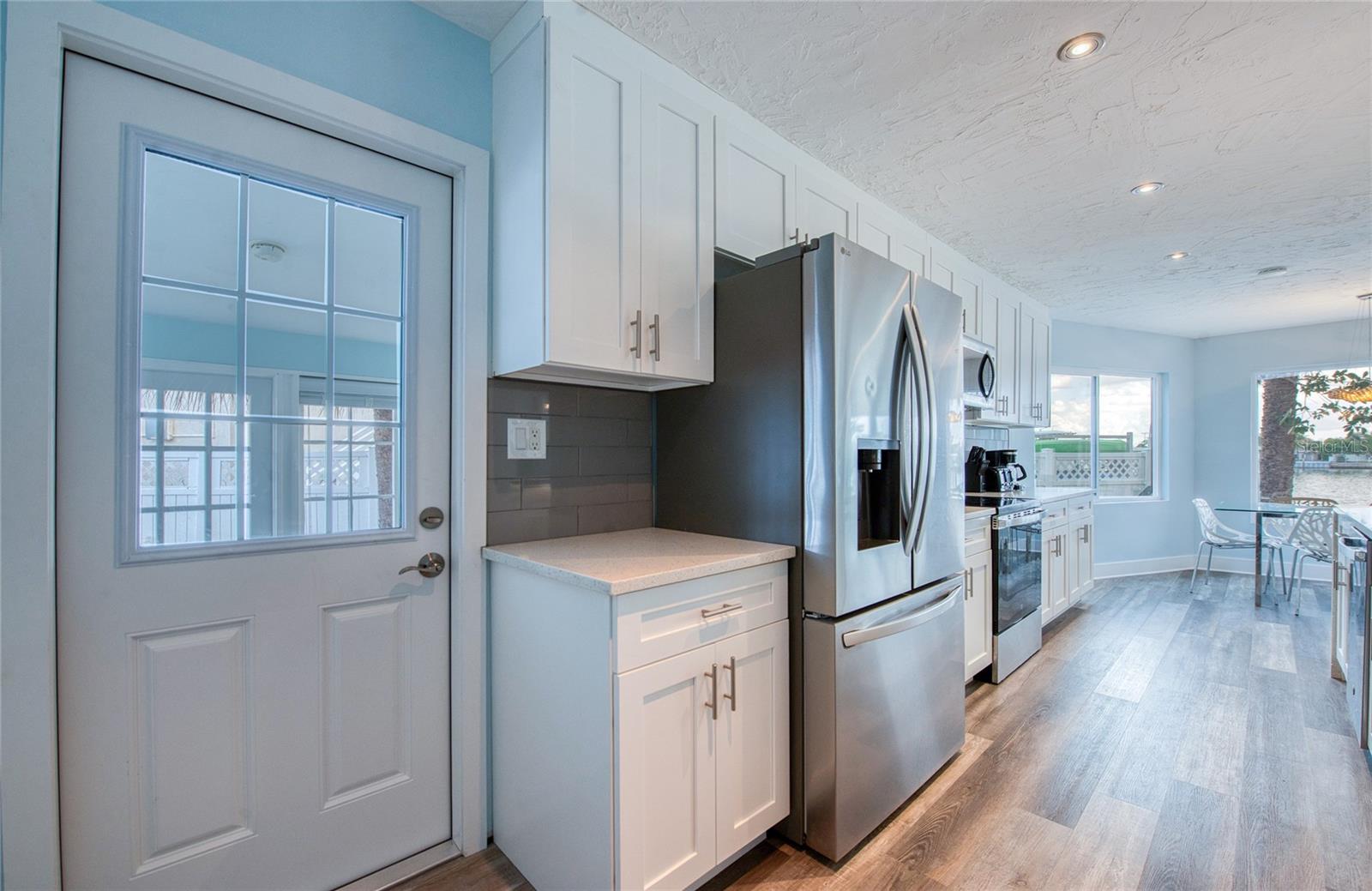 Door to bonus room off kitchen