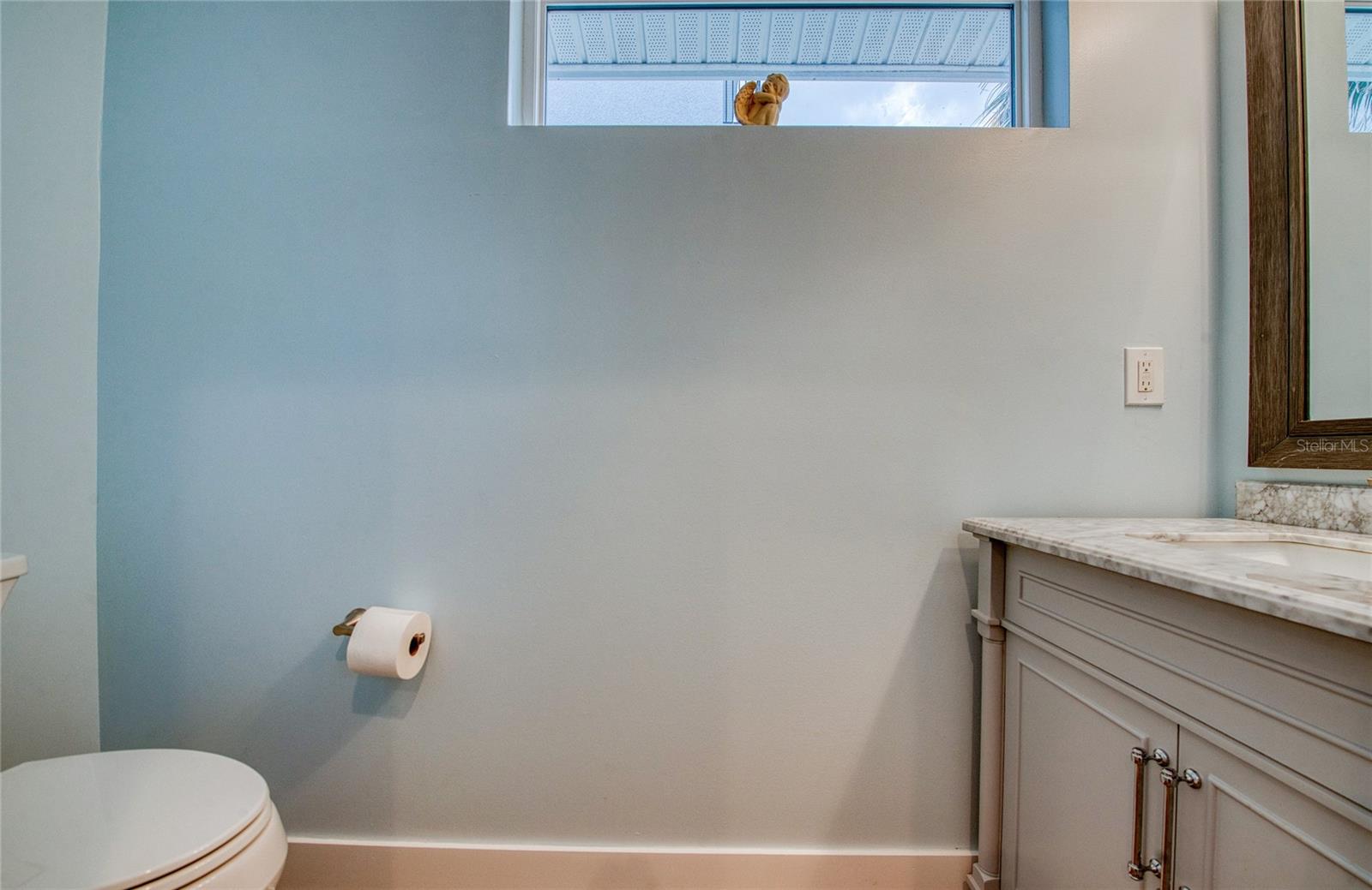 Half bathroom by front door