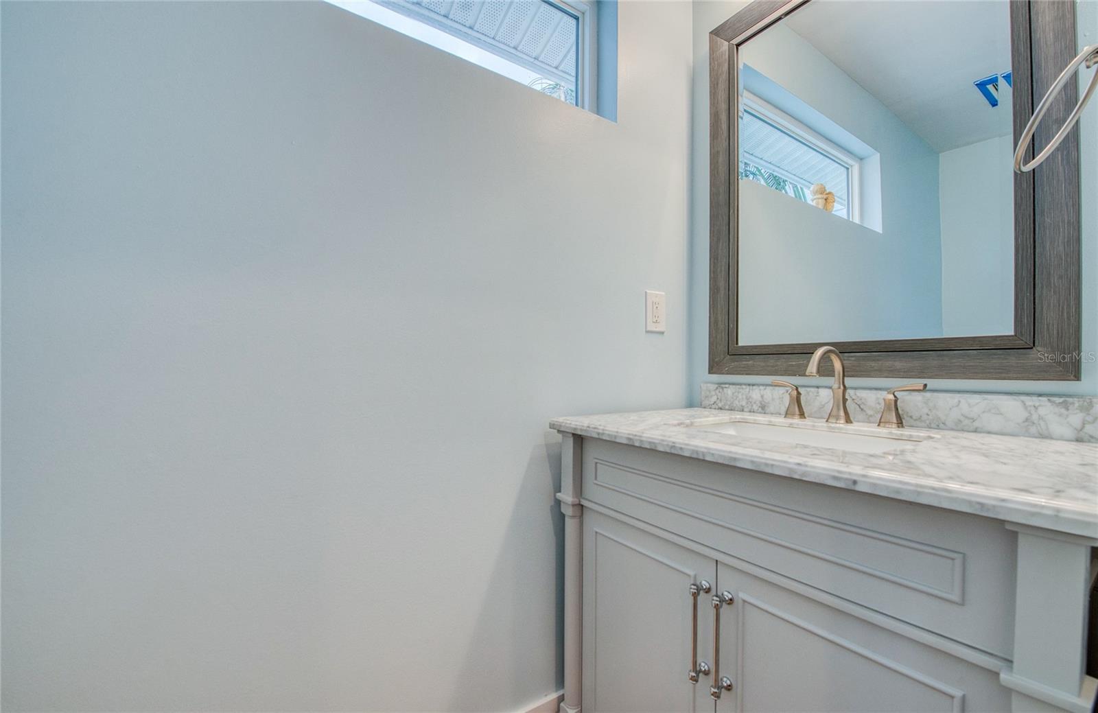 Half bathroom by front door