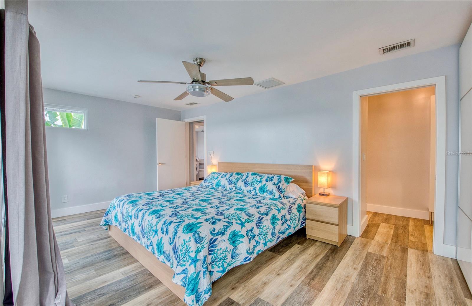 Primary bedroom with private balcony overlooking the intracoastal waters