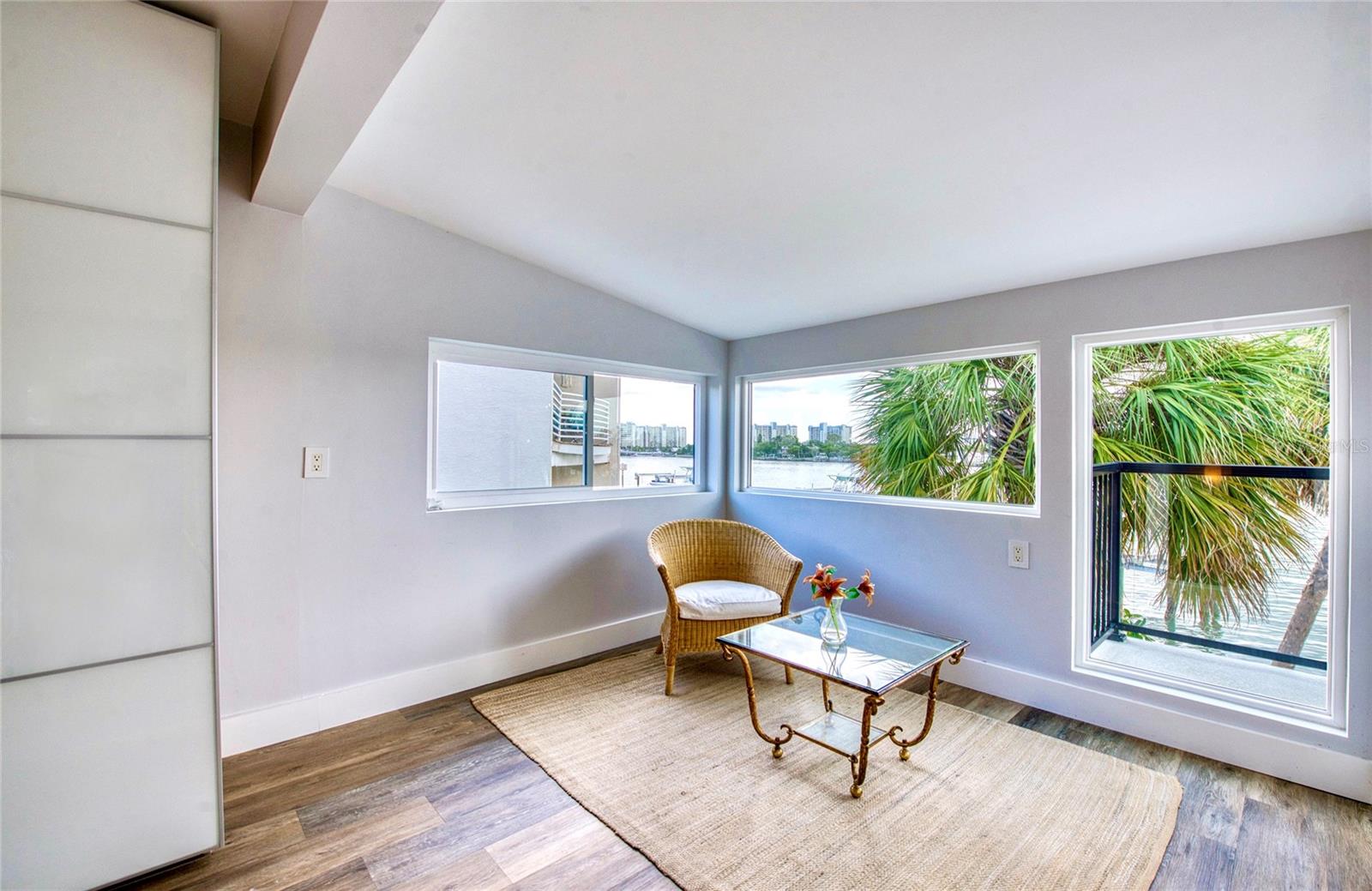 Seating nook in primary bedroom overlooking the intracoastal waters