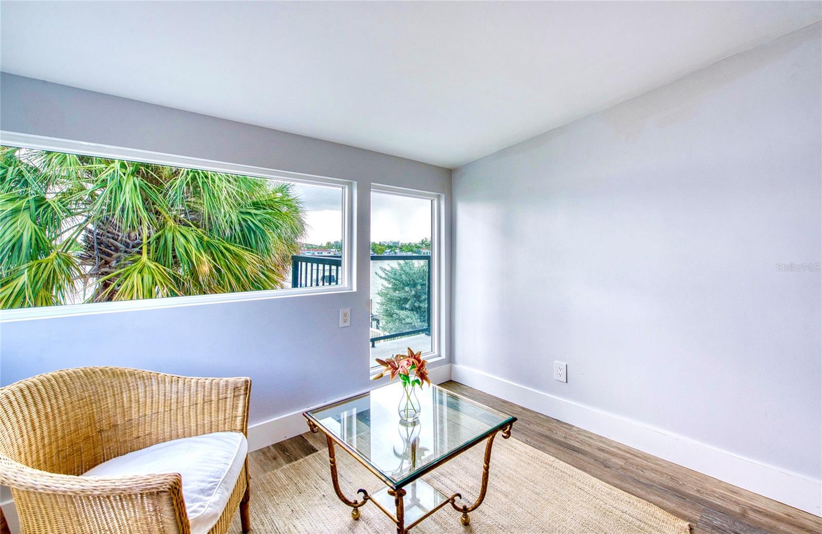 Seating nook in primary bedroom overlooking the intracoastal waters