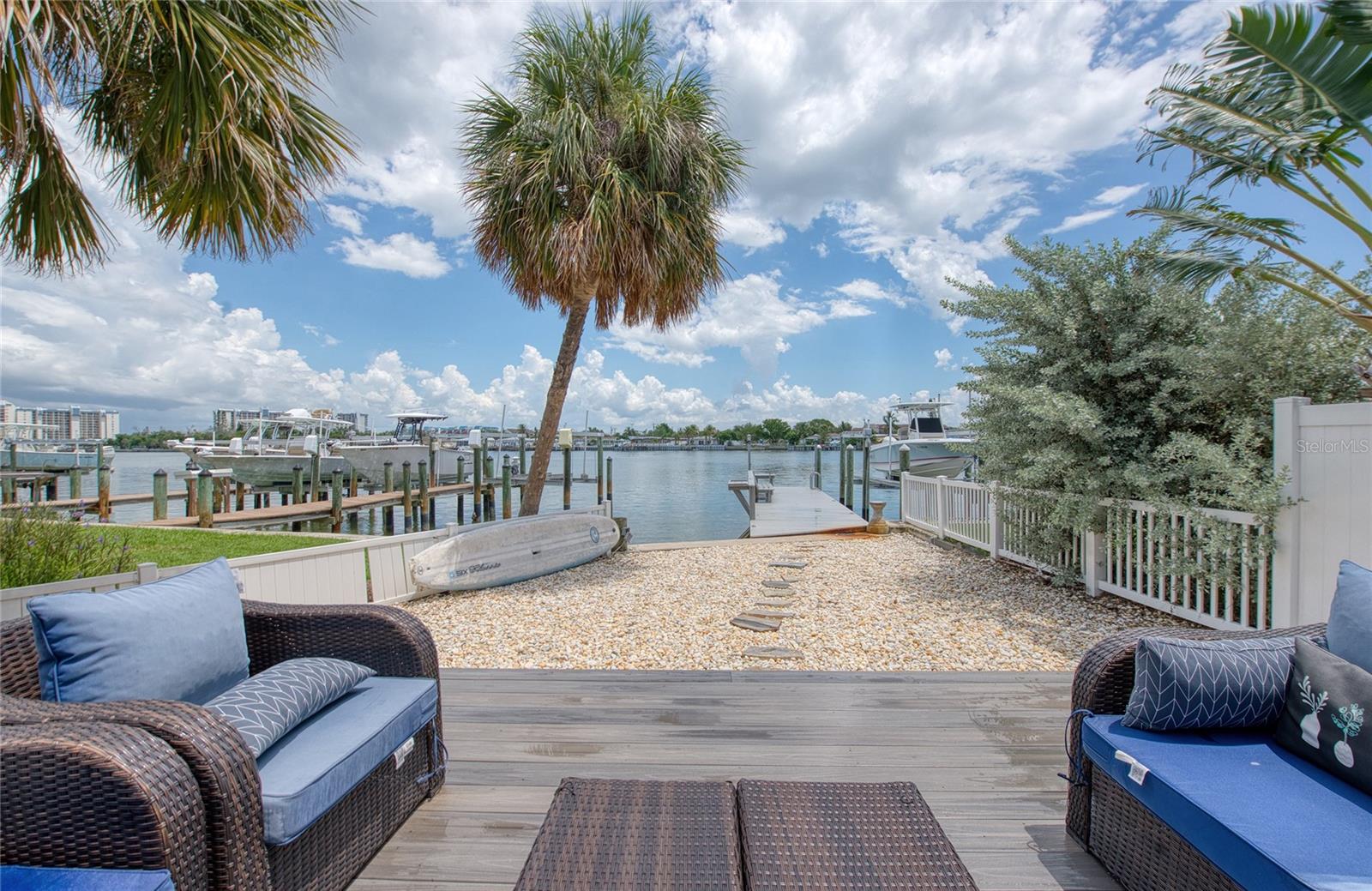 View of intracoastal waters from the outdoor living area and wooden deck