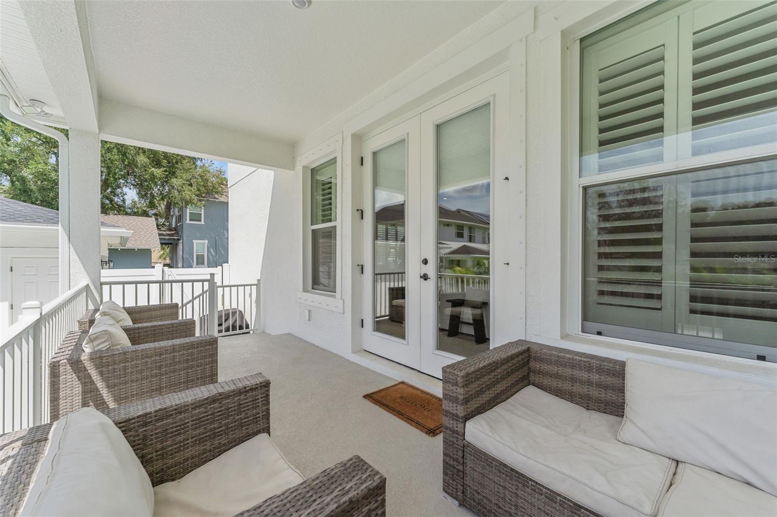 elevated back porch overlooking the pool