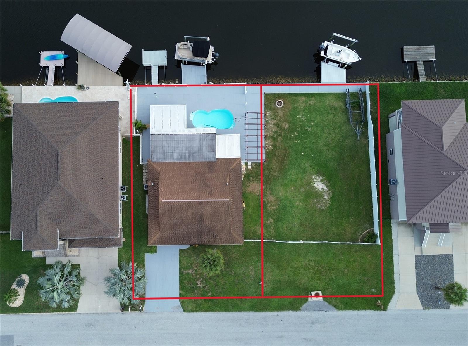 You can divide and sell or BUILD on second lot (or keep for breathing room and all your toys)!