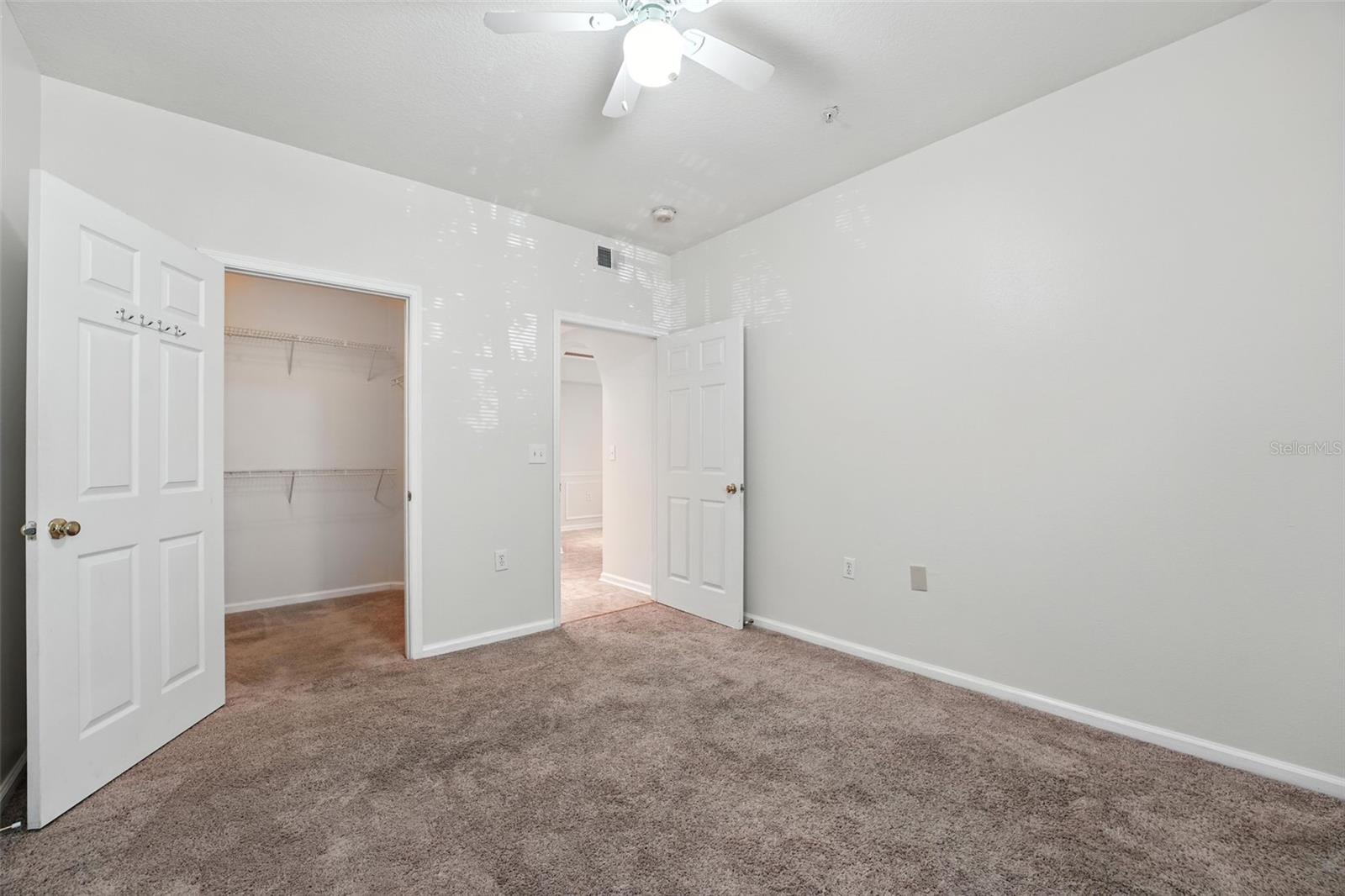 Secondary Bedroom with walk-in closet