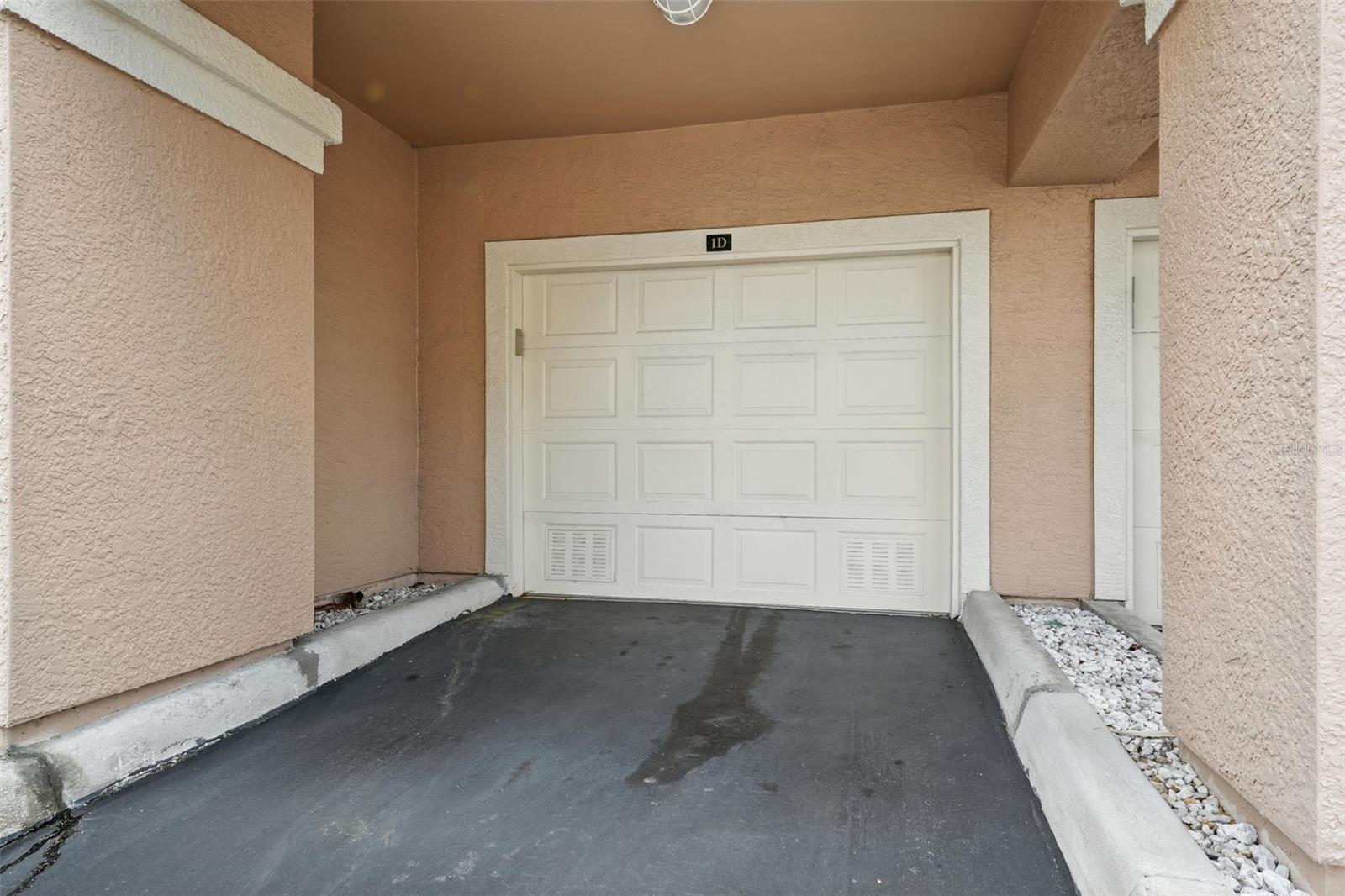Garage has covered parking right in front of garage door