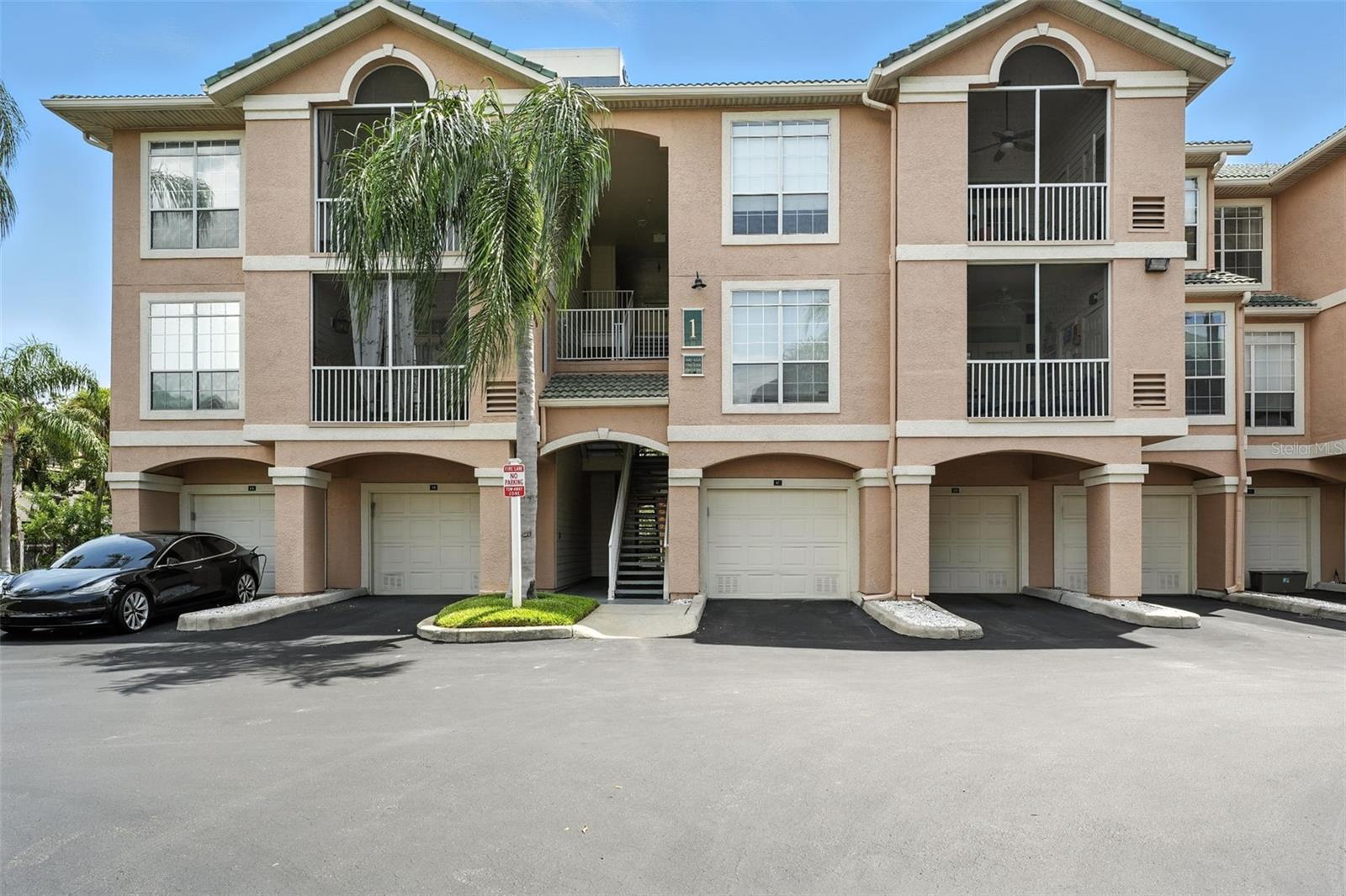 Building 1, First floor condo, Garage 1D