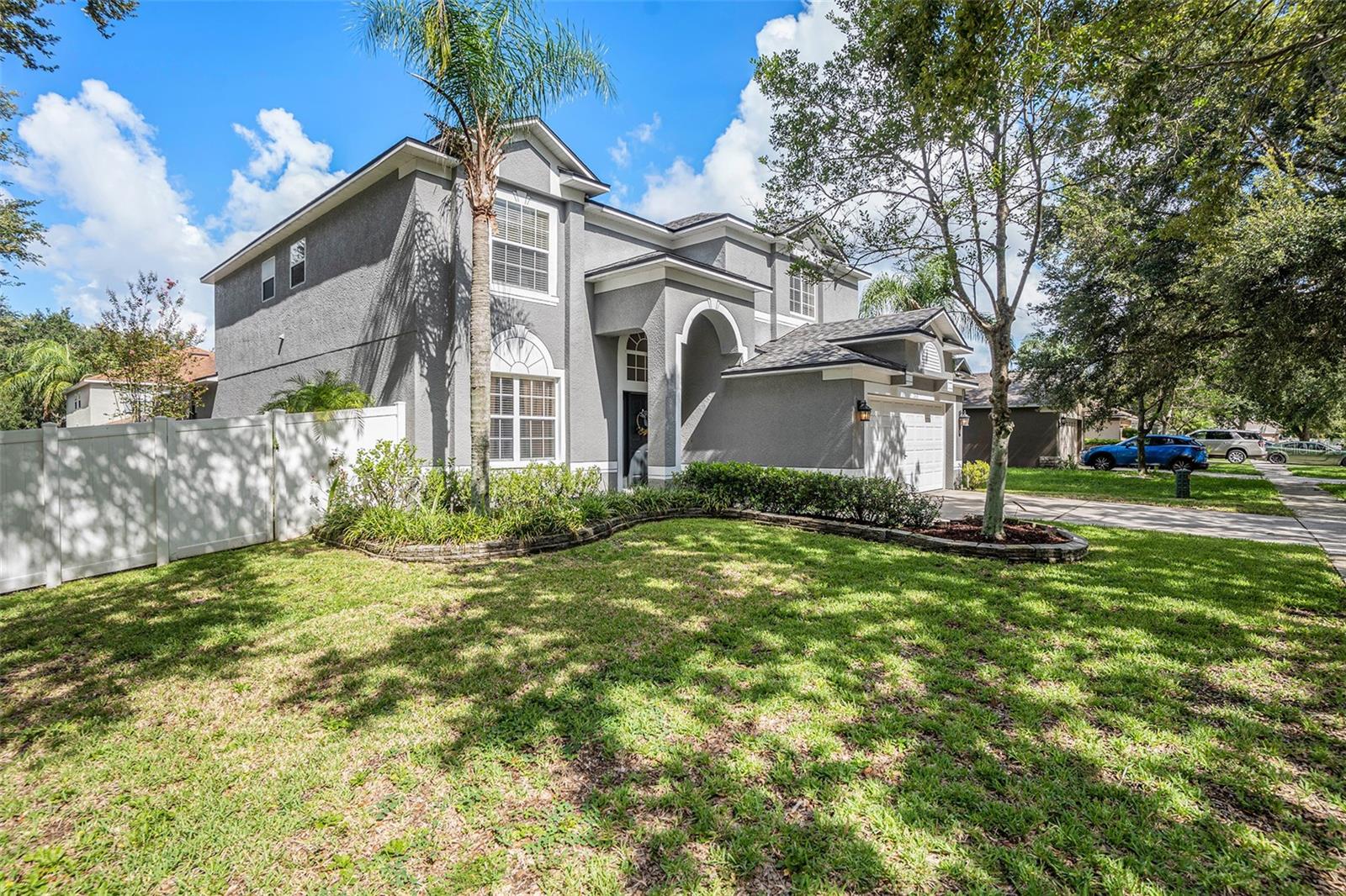 Beautifully landscaped frontyard in Buckhorn Preserve. LOW HOA & NO CDD!