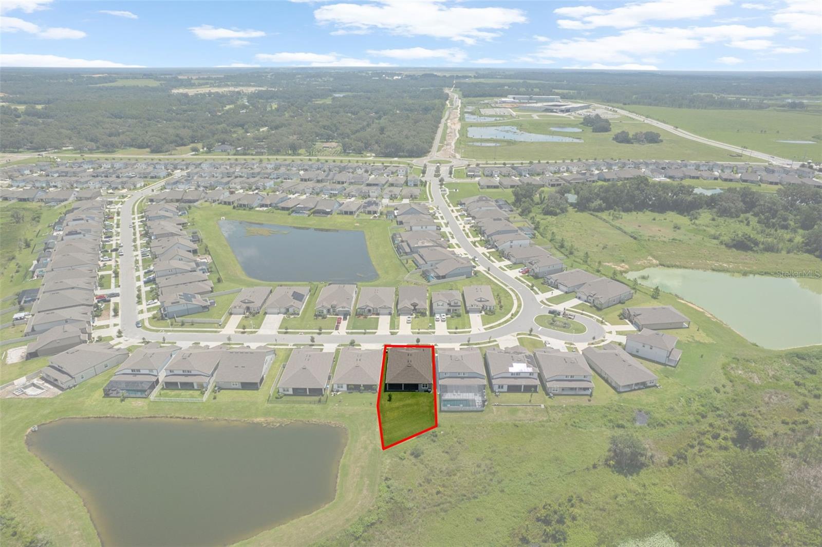 Located on King Lake.  Retention pond is to the left