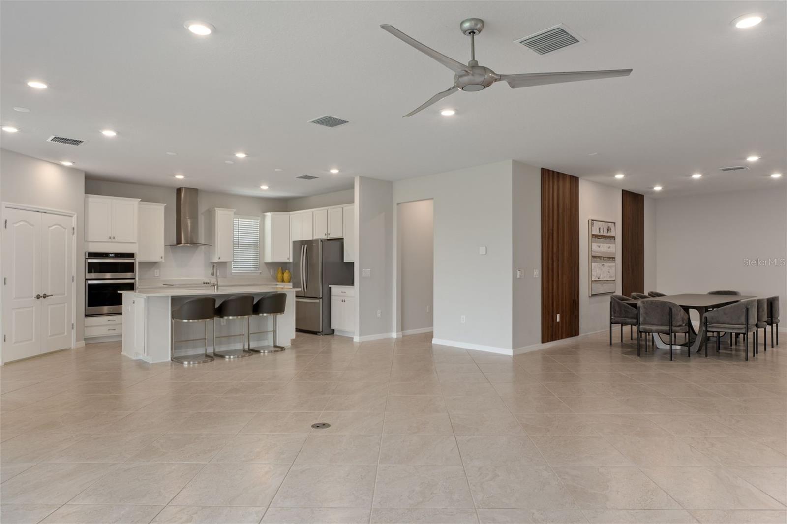Living Room to Kitchen and dining area to the right.  Laundry is just through the doorway along with flex space