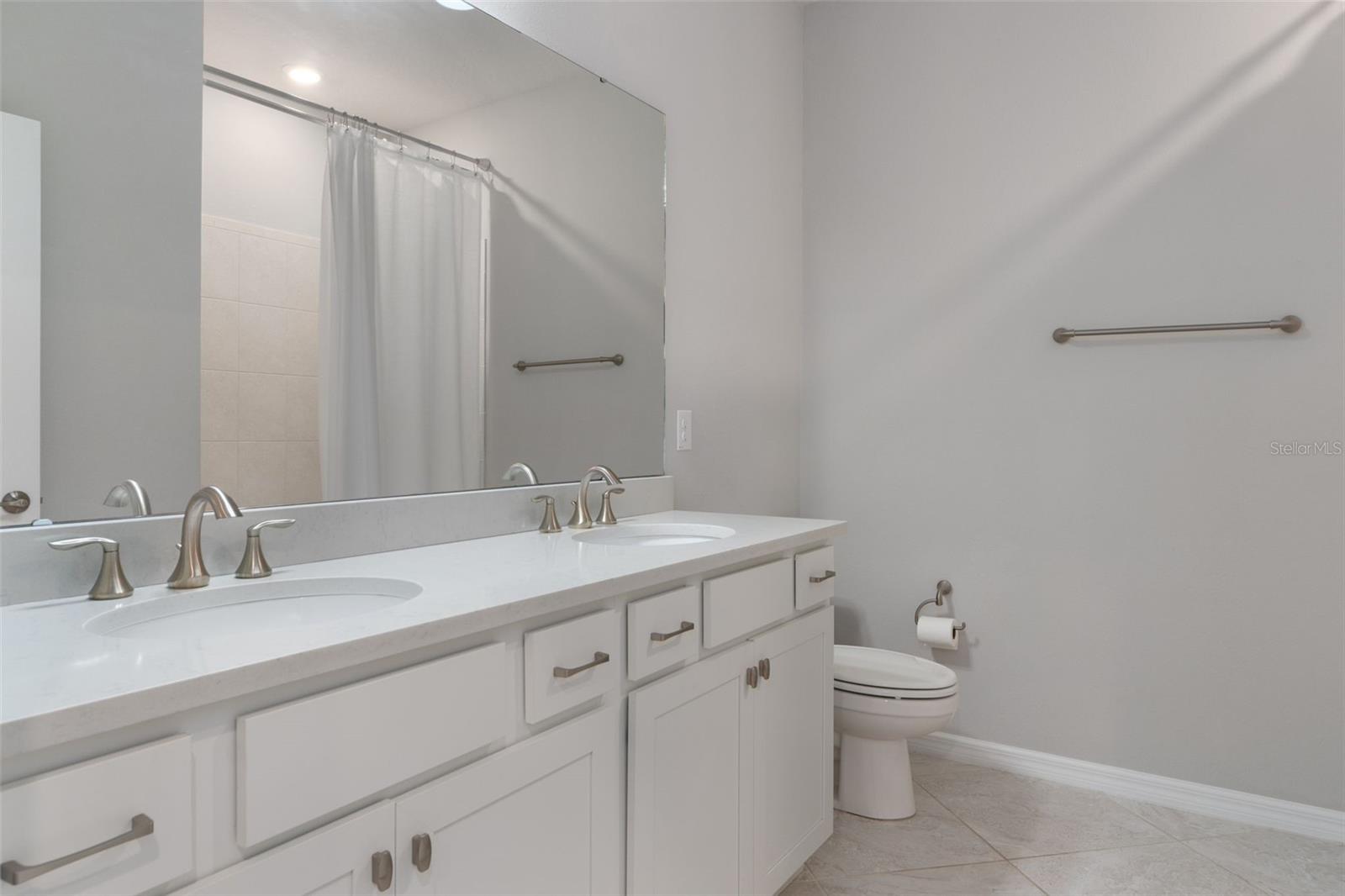 Bath two with dual vanities