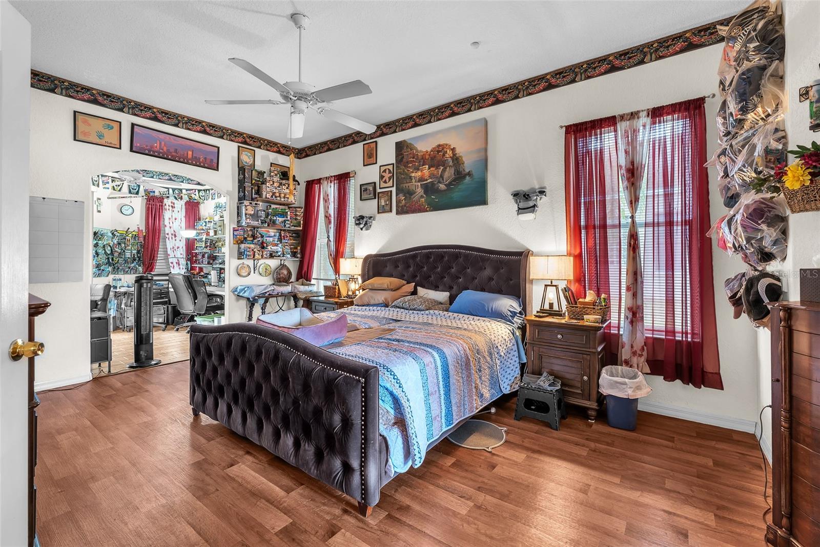 Primary bedroom has vinyl plank flooring