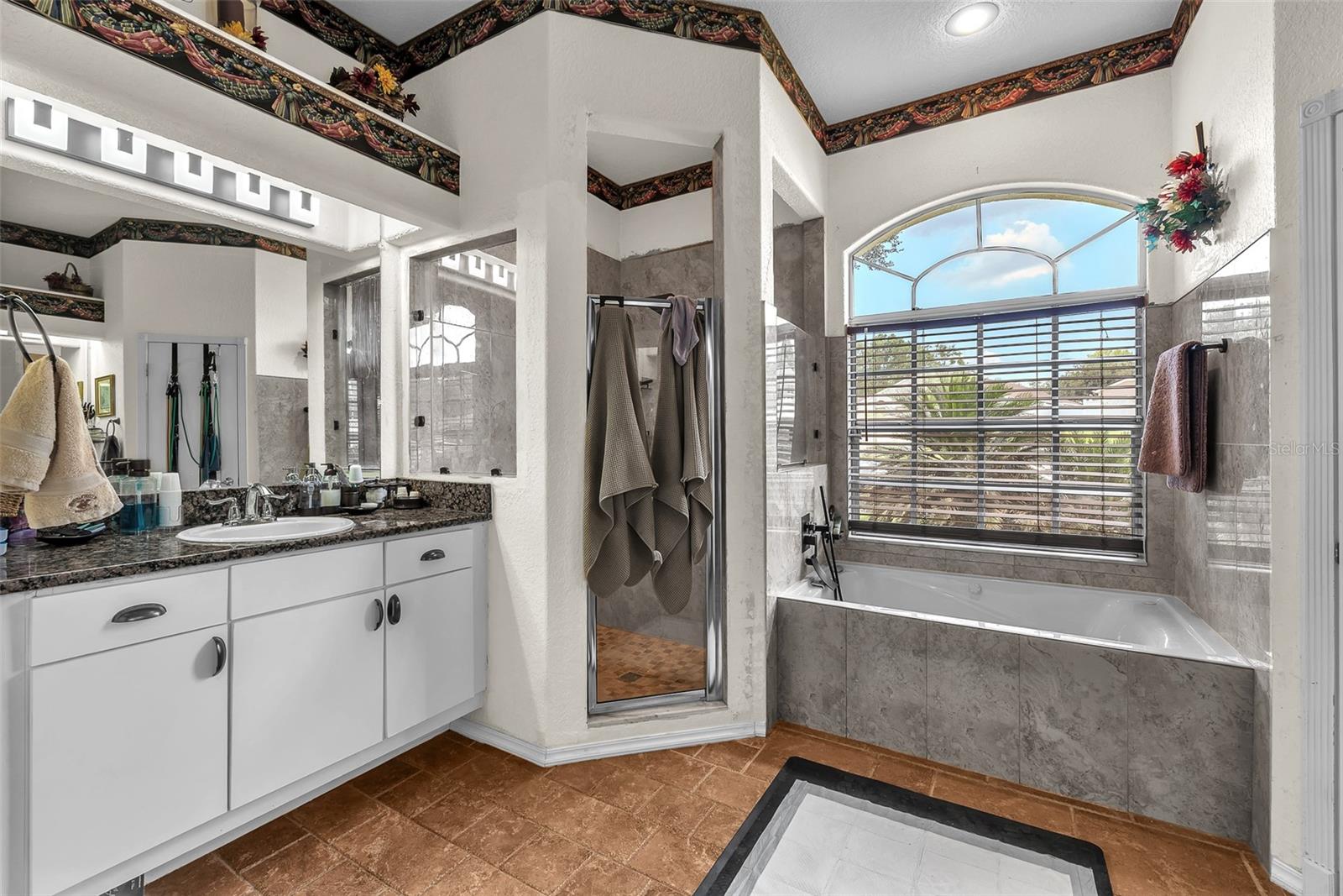Primary bath with garden tub and separate shower