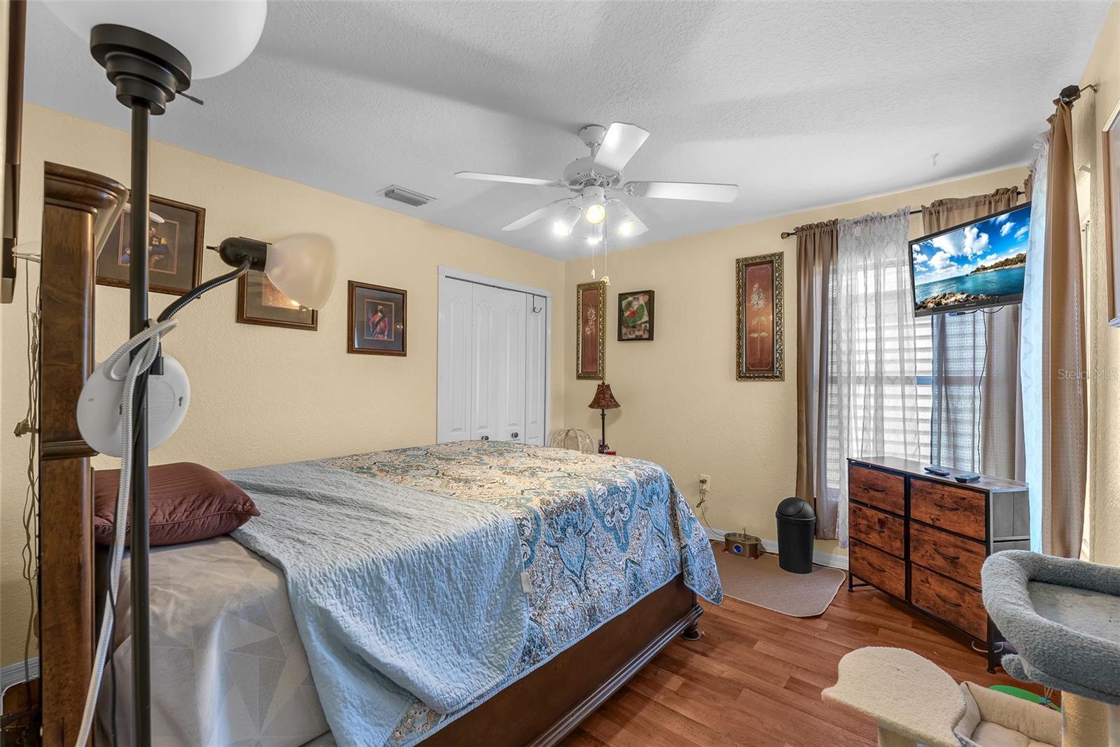 Bed 2 with vinyl plank flooring