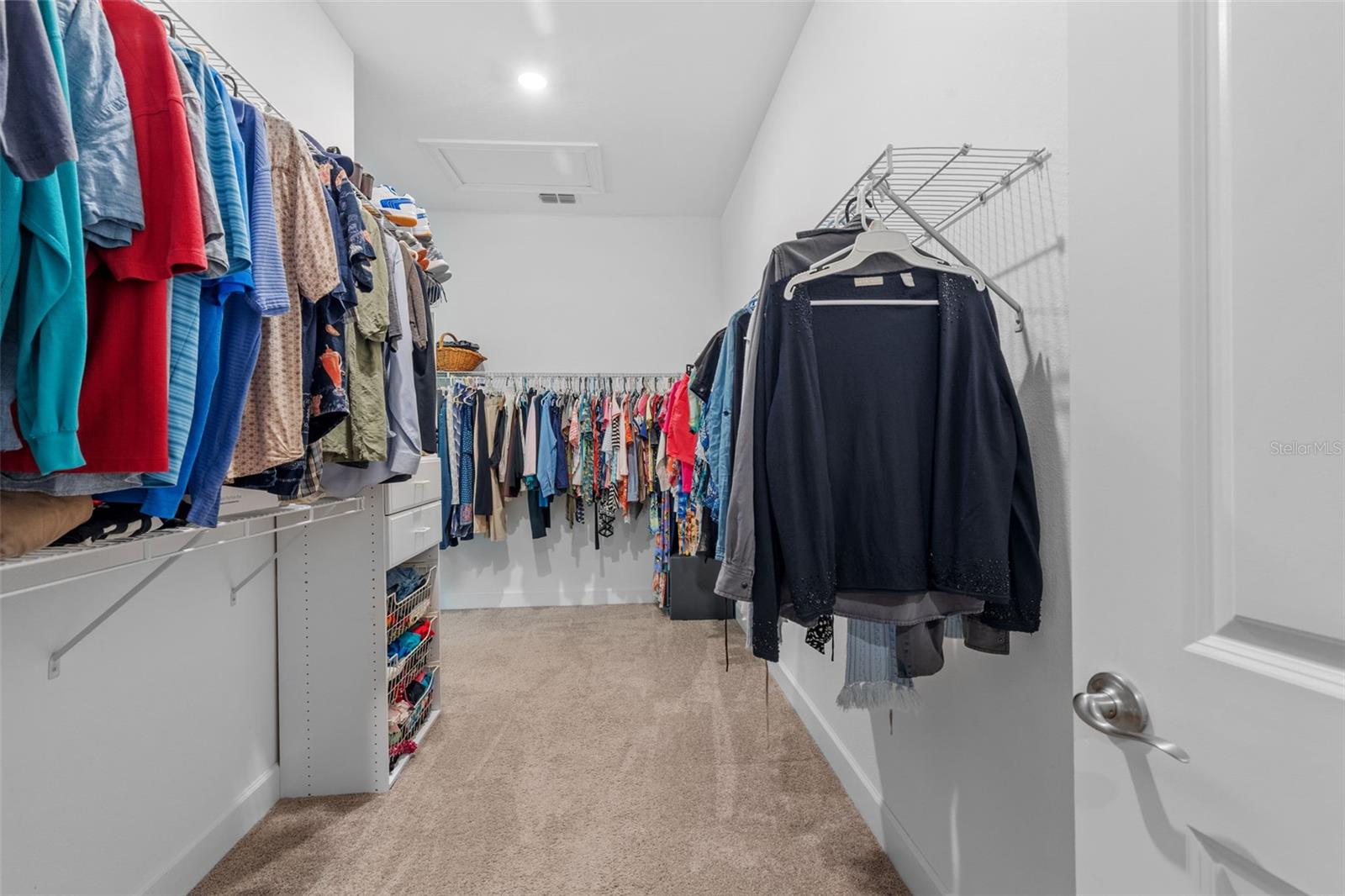 Large primary wrap around walk-in closet