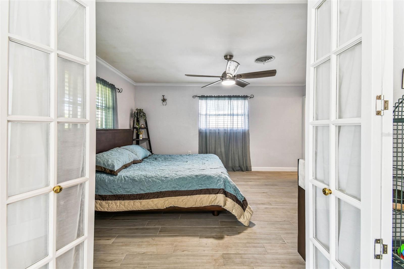 French doors into primary bedroom