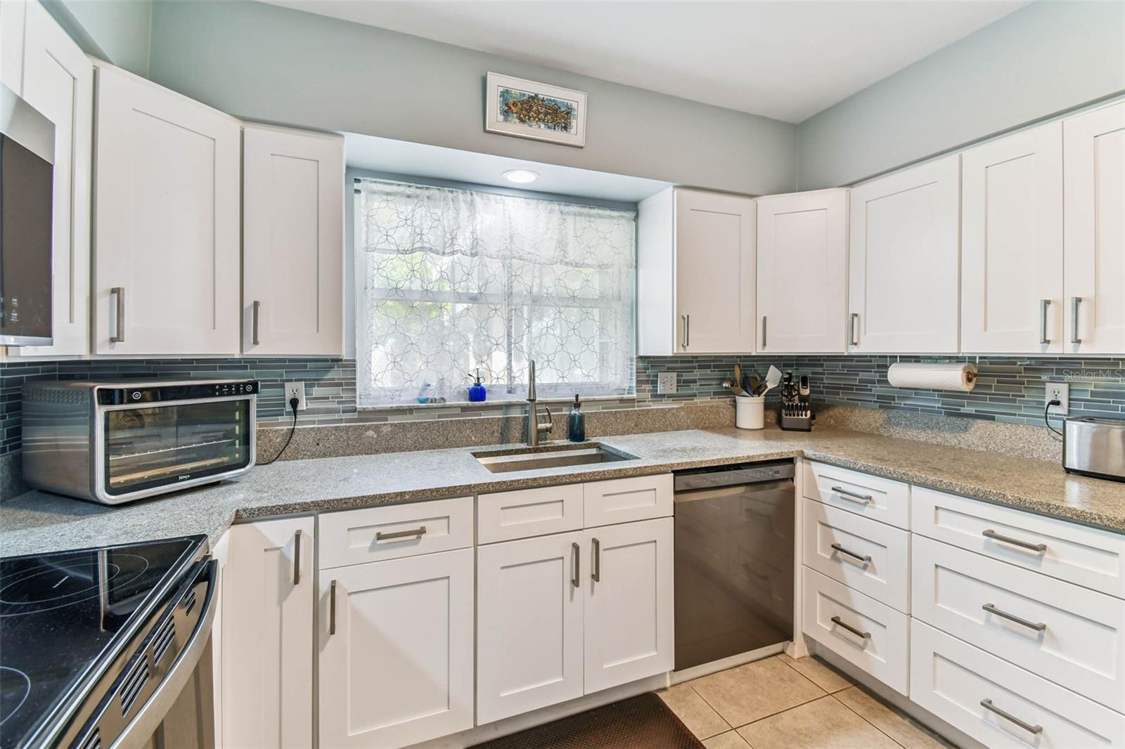New soft close shaker cabinetry