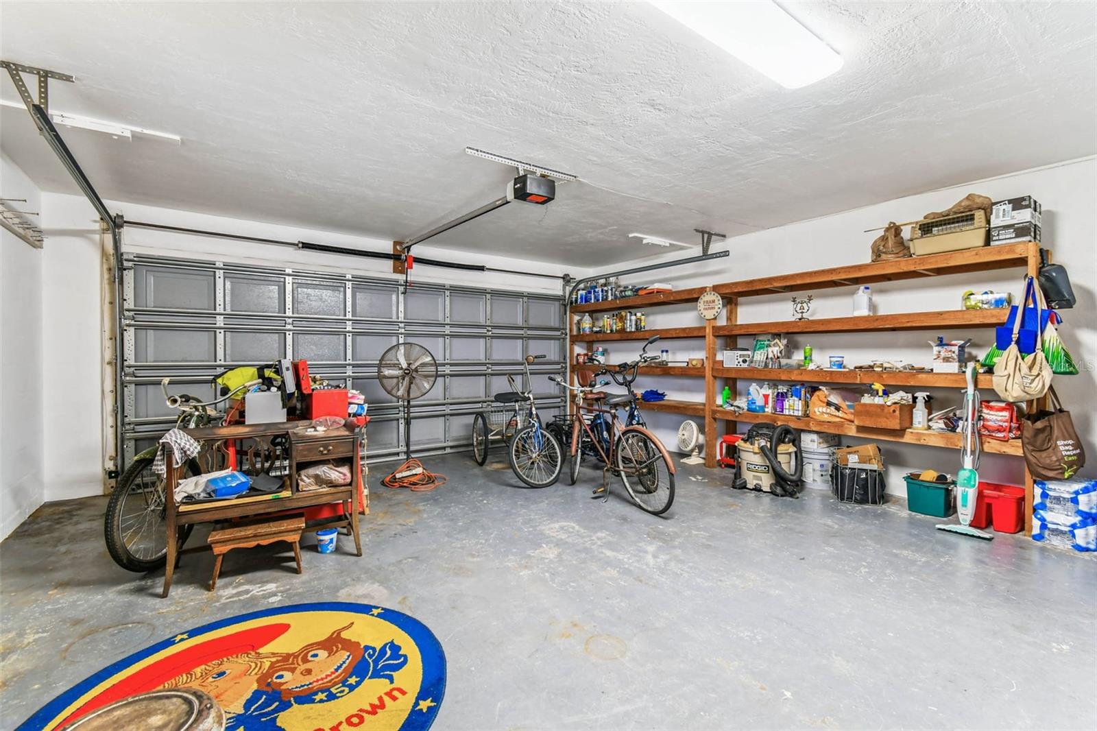 2-car garage with built in shelving