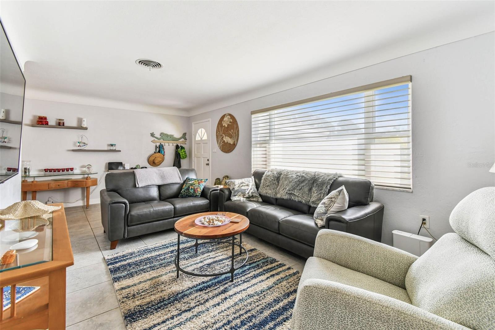 Living room with ceramic tile flooring