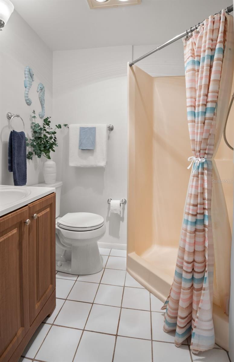 Secondary full bath with shower.