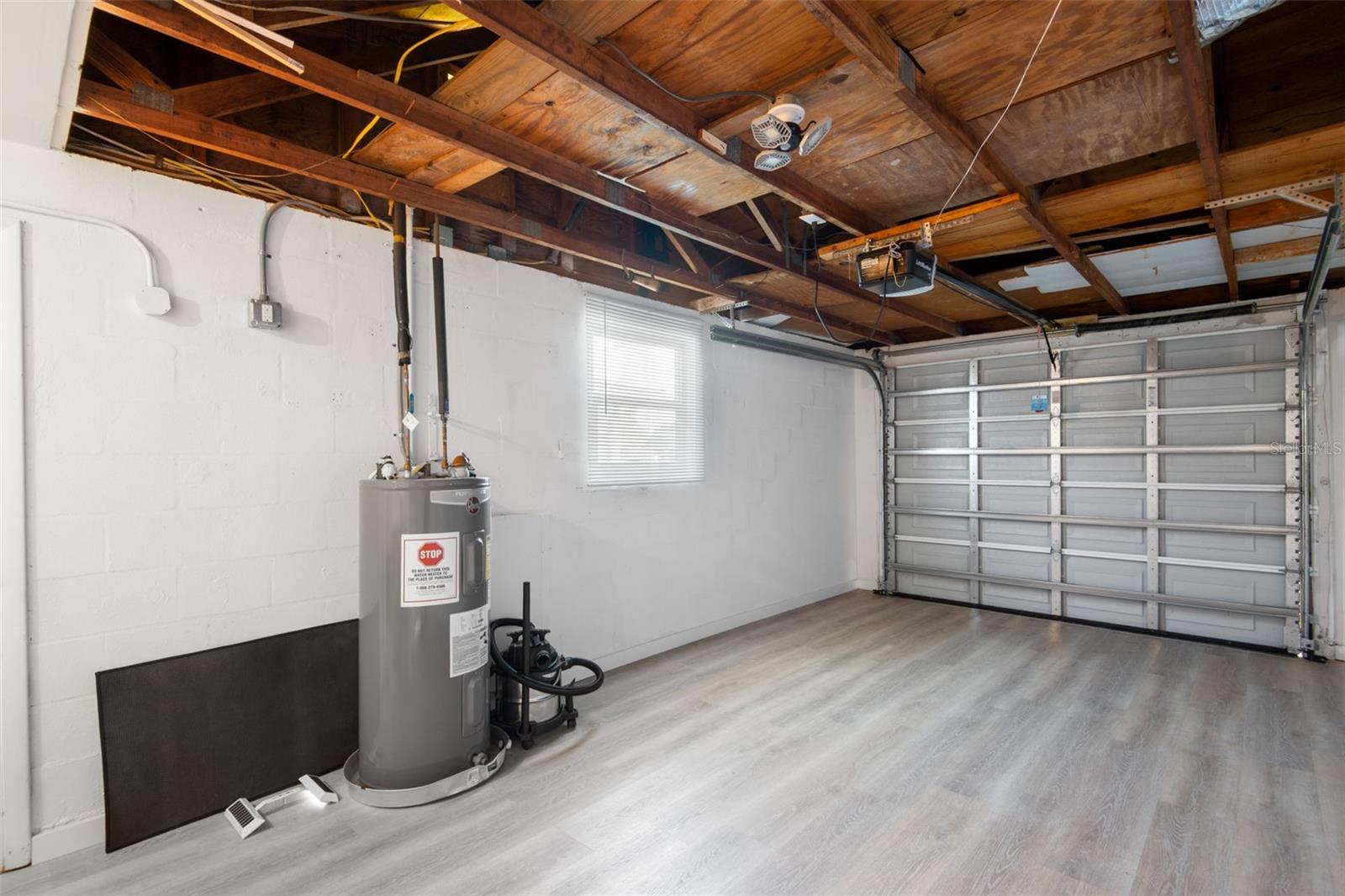 Garage with finished floor.