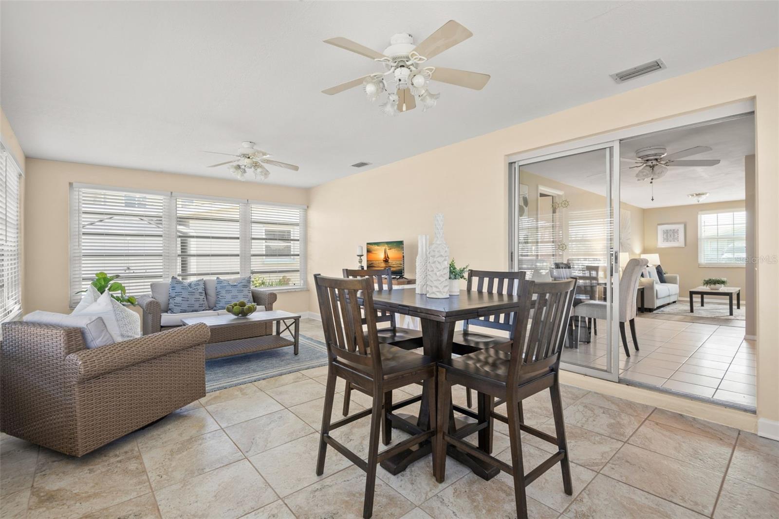 Spacious room surrounded by windows and views of the waterfront and your dock.